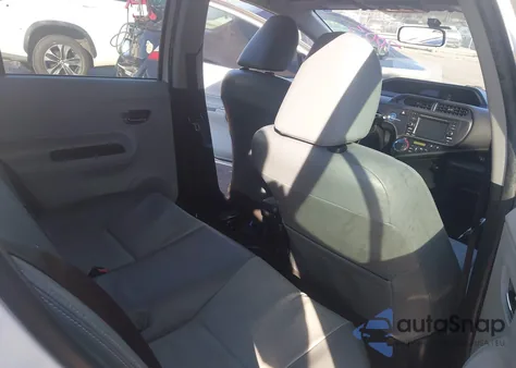 2013 Toyota Prius C Four from USA, damaged, VIN JTDKDTB30D1047003